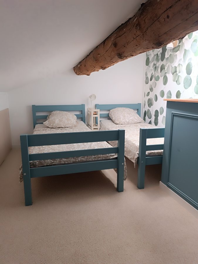 Mezzanine — two single beds under the eaves