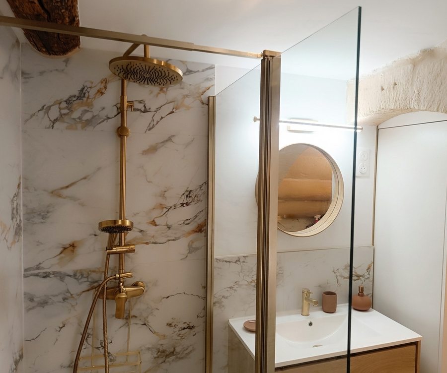 Marble bathroom with gold fixtures